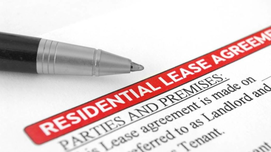 image of lease with a pen on top of it